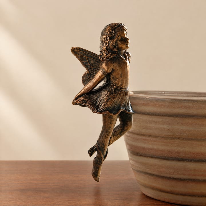 The Hanging Fairy Figurine, Leaning forward, legs down