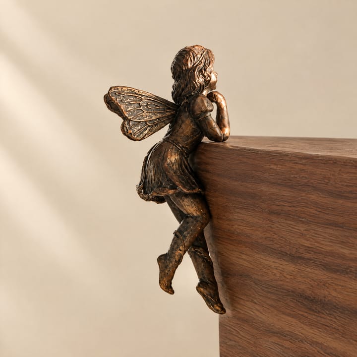 The Hanging Fairy Figurine, Sitting on edge, legs crossed